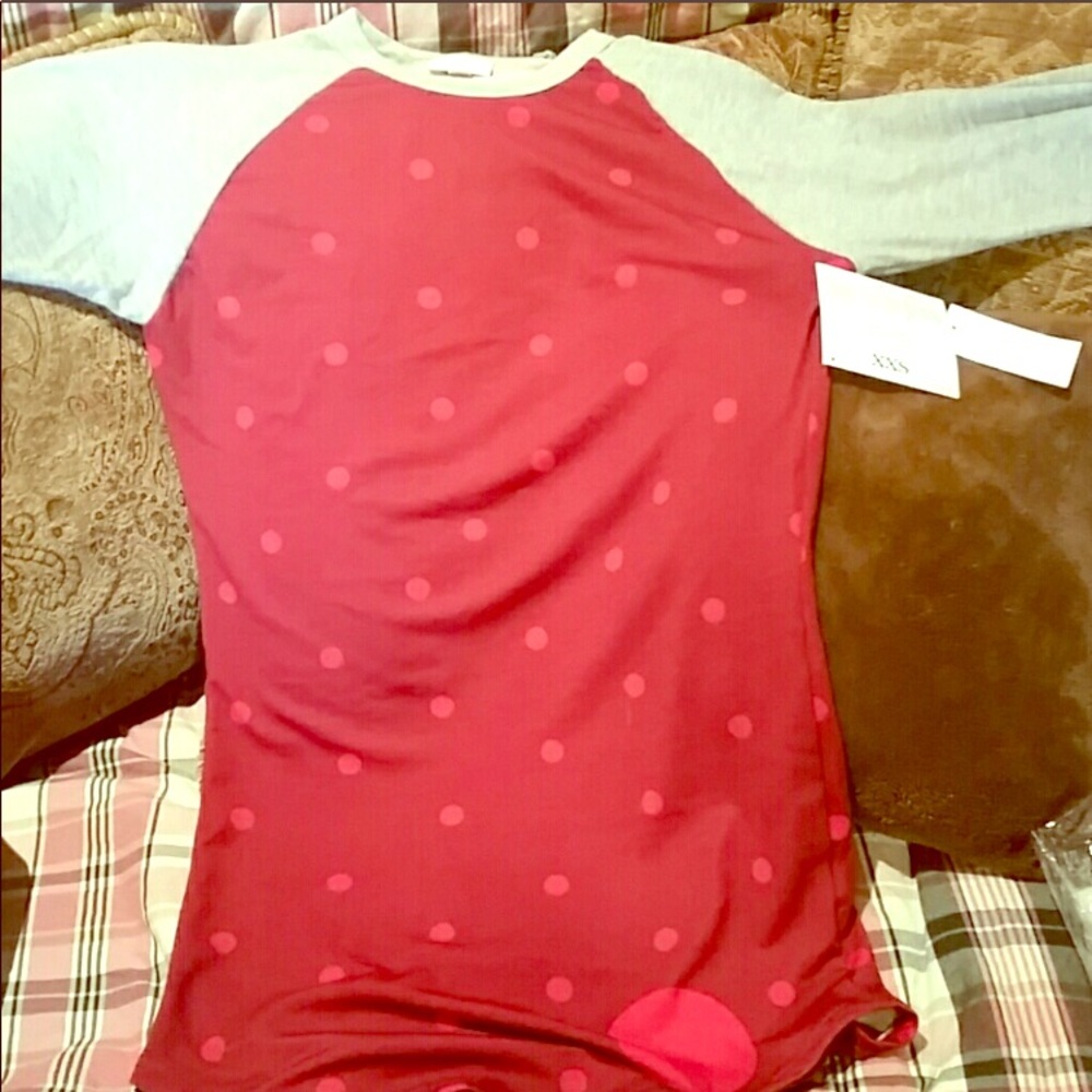 BUNDLE OF 2 LULAROE SHIRTS. 1st NWT. 2nd like new